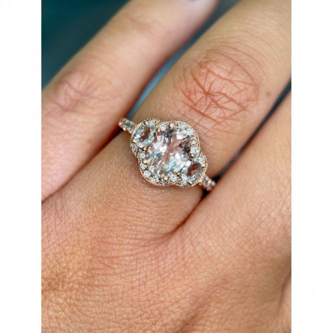 Faith Diamonds 9ct Canadian Rose Gold 3 Stone Oval Morganite with Single Halo Diamond Ring