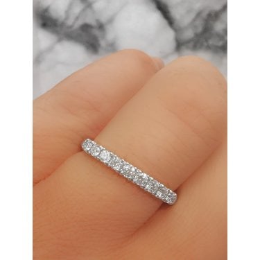 9ct Canadian WG 0.25ct Round Brilliant Beaded Edge Wedding/Eternity Ring Diamond carat weight - 0.25ct Cut - Round Brilliant Colour - G/H Colour Clarity - Si1/Si2  Size M (Sizes Available to Order)