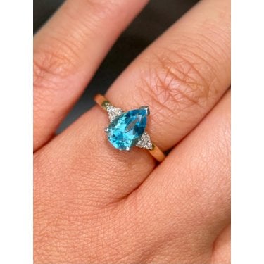 9ct Yellow Gold Blue Topaz Pear with Diamond Shoulders Ring