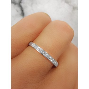 Platinum 0.15ct Round Brilliant Channel Set Diamond Eternity Ring Diamond carat weight - 0.15ct Cut - Round Brilliant Colour - G/H Colour Clarity - Si1/Si2  Size M (Other Sizes Available to Order)