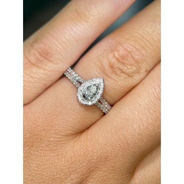 Platinum 0.45ct Total Pear Cut Centre with Single Halo & Split Diamond Shoulders Ring