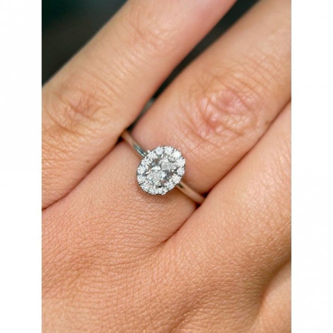 Faith Diamonds Platinum 0.46ct Total Oval Cut Diamond Centre with Diamond Halo Ring