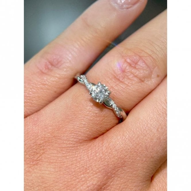 Faith Diamonds Platinum 0.50ct Round Brilliant Centre with Twist 0.15ct Diamond Shoulders Ring