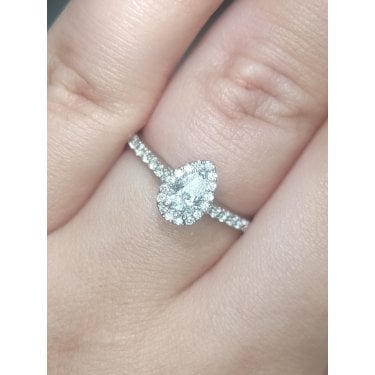 Platinum 0.65ct Total Pear Cut Centre with Single Halo & Diamond Shoulders Ring