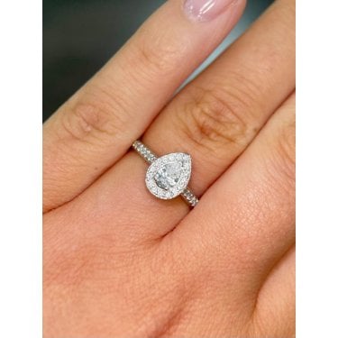 Platinum 0.66ct Total Pear Cut Diamond Centre with Halo & Diamonds Shoulders Ring