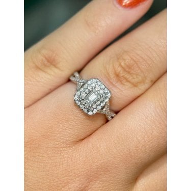 Platinum 0.70ct Total Emerald Cut Centre with Double Halo & Twist Diamond Shoulders Ring