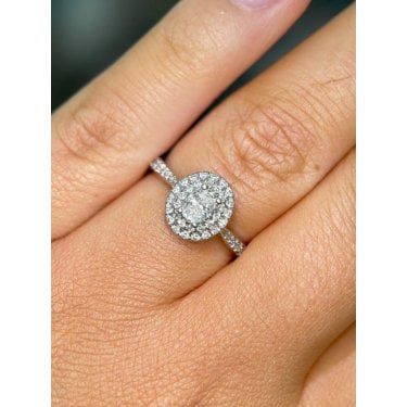 Platinum 0.70ct Total Oval Cut Solitaire with Double Halo & Diamond Shoulders Ring