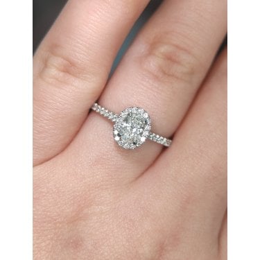 Platinum 0.85ct Total Oval Cut Centre with Single Halo & Diamond Shoulders Ring