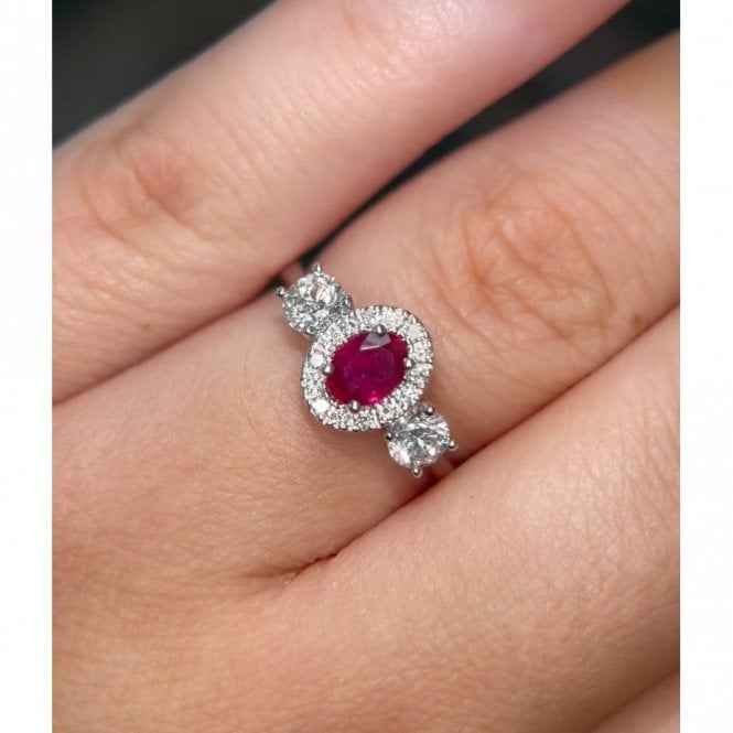 Faith Diamonds Platinum Oval Ruby with 0.60ct Diamond Halo & Single Round Brilliant Cut Sides Ring