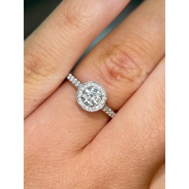Platinum Total 0.65ct Round Brilliant Centre with Single Halo & Diamond Shoulders Ring