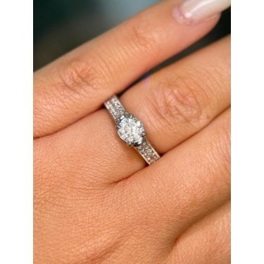 Platinum Total 1.40ct Round Brilliant Solitaire & Beaded Edge Diamond Shoulders & Raised Setting Ring